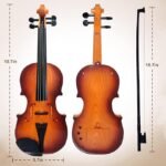 Classic wooden violin with bow on white background